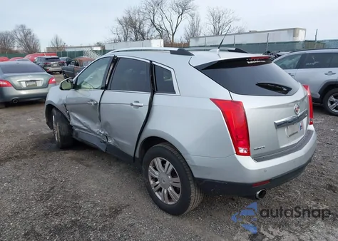 2012 Cadillac Srx Luxury Collection z USA, uszkodzony, nr VIN 3GYFNAE32CS502486
